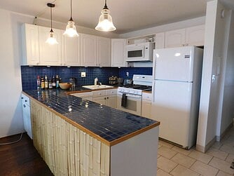 With the fully-equipped kitchen, you can cook your own meals at home!