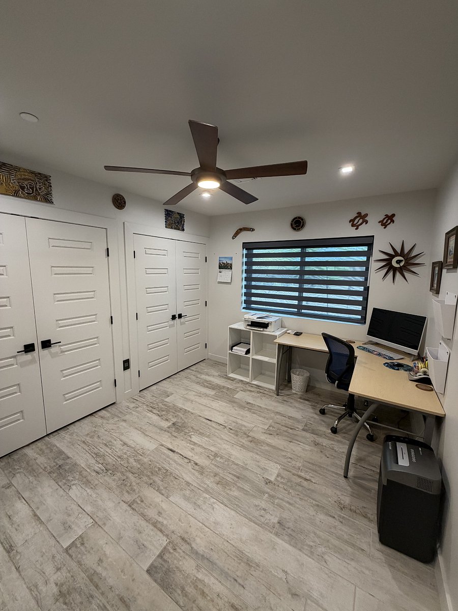 Third bedroom works as an office with a desk for your computer(s) and a printer and lots of office supplies.  Room to exercise and watch a small tv.