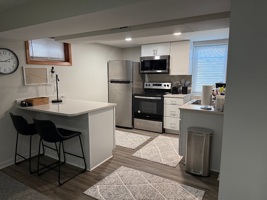 Kitchen with dedicated workspace and office supplies