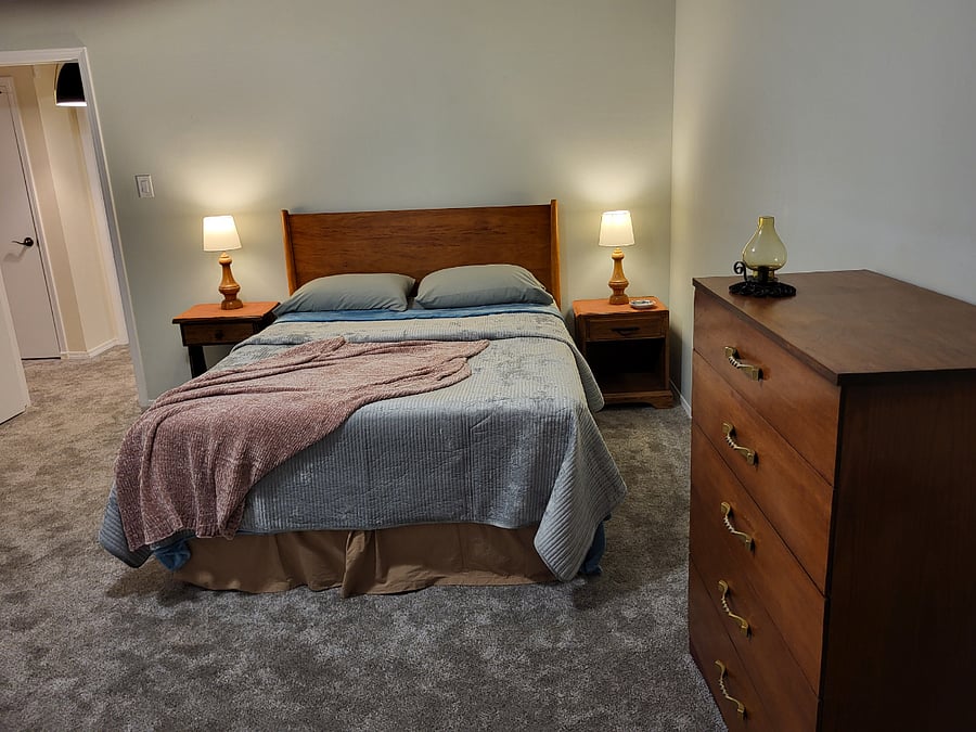 Primary Bed Room with Vintage Ranch Oak lamps and night standsVintage