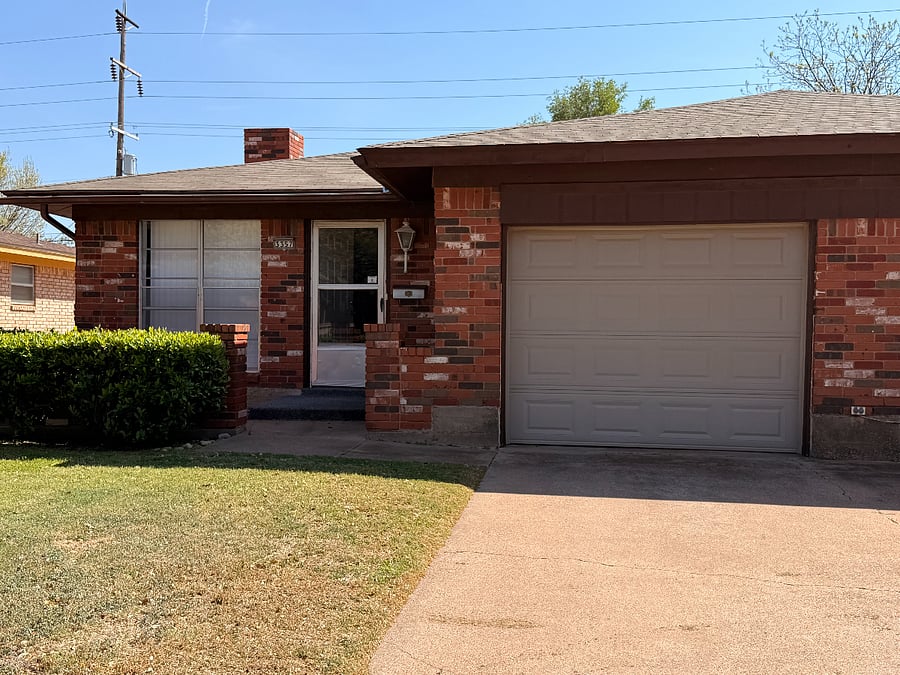 One car garage in front.  Driveway for one vehicle.