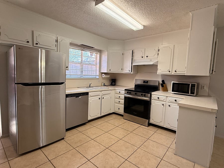 Fully stocked kitchen with new fridge, stove, dishwasher, microwave.  Spices, oil, cookware, dishes, utensils all included.