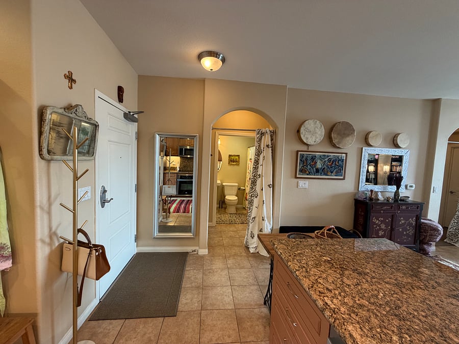 From kitchen can see entrance into your en-suite bathroom and entire bedroom suite area that is yours.