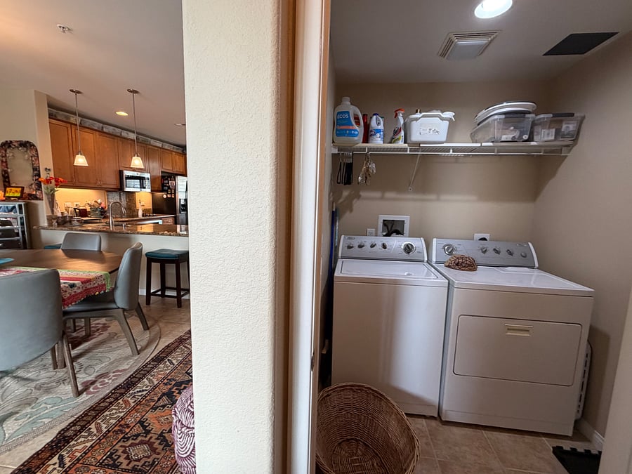 Washer/dryer in condo located off hallway that goes to my master suite.