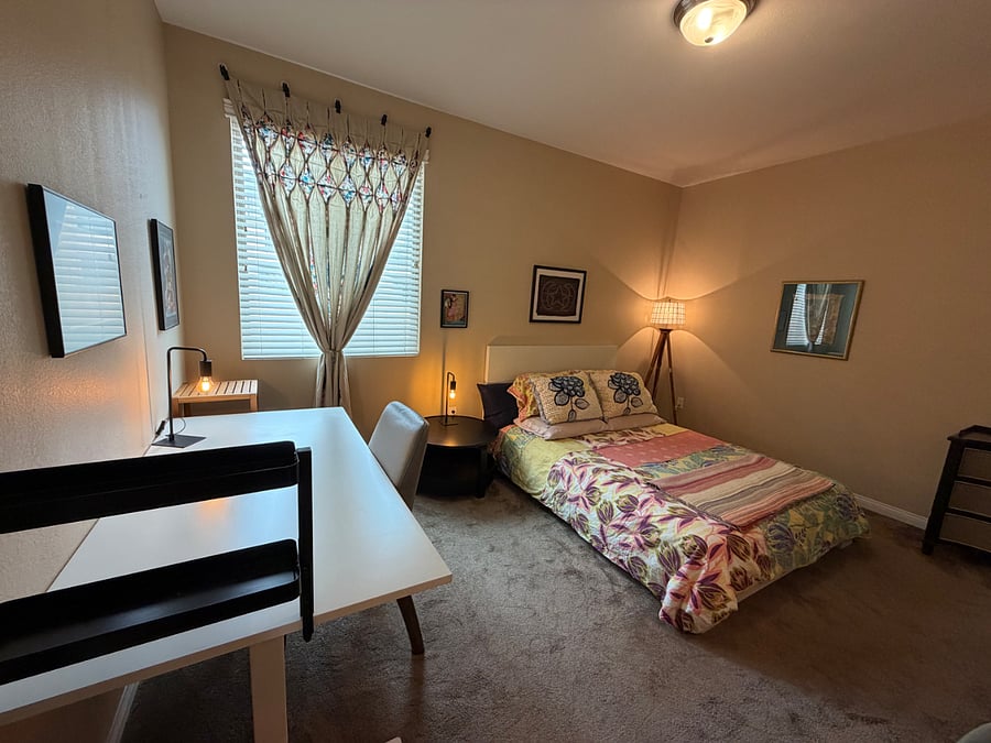 Your master suite with height adjustable desk and window that gets morning easterly light.