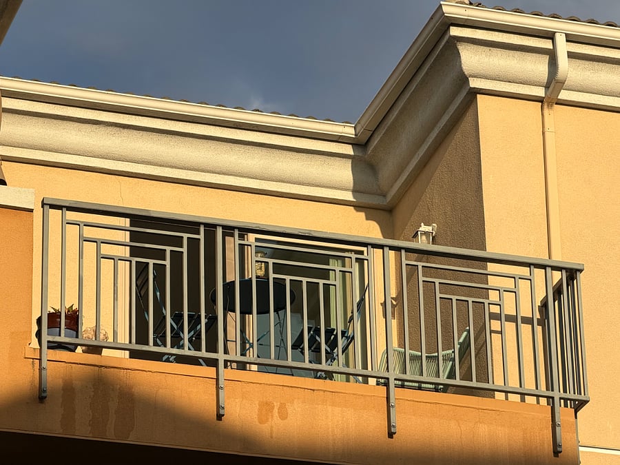 the private 3rd floor balcony that is part of the condo.