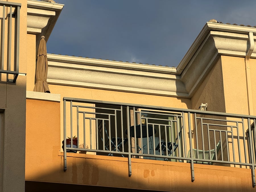 the private 3rd floor balcony that is part of the condo.