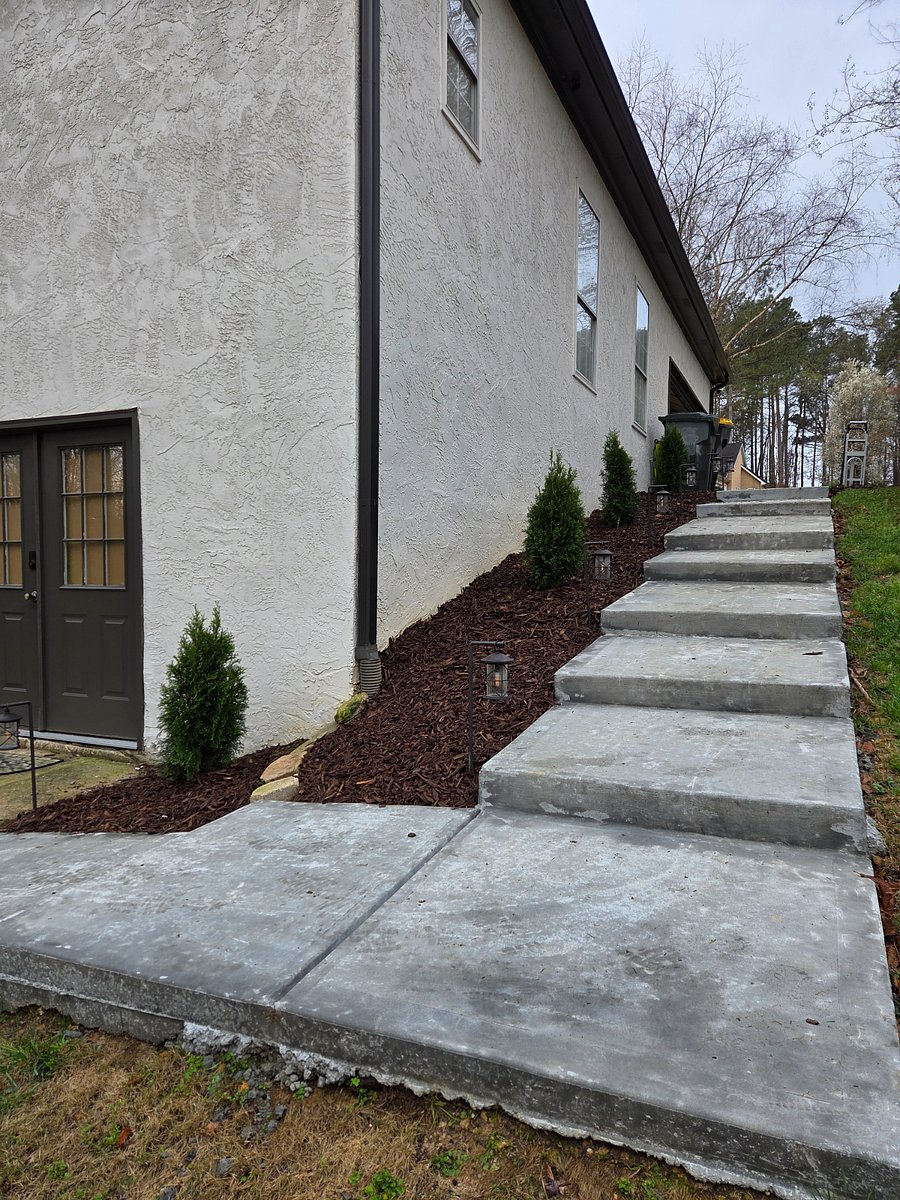 Dedicated parking space is at top of these stairs. Follow these stairs around to the backyard to private entrance. 