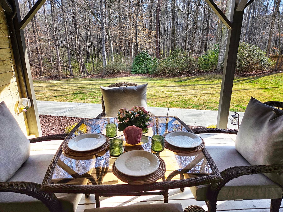 Enjoy relaxing on the private porch. There is an outlet by the outdoor table in case you would like to work outside. 
