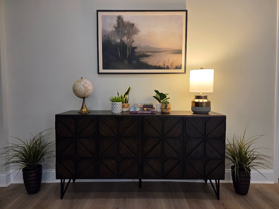 Enjoy games, cards and books stored in the credenza. 