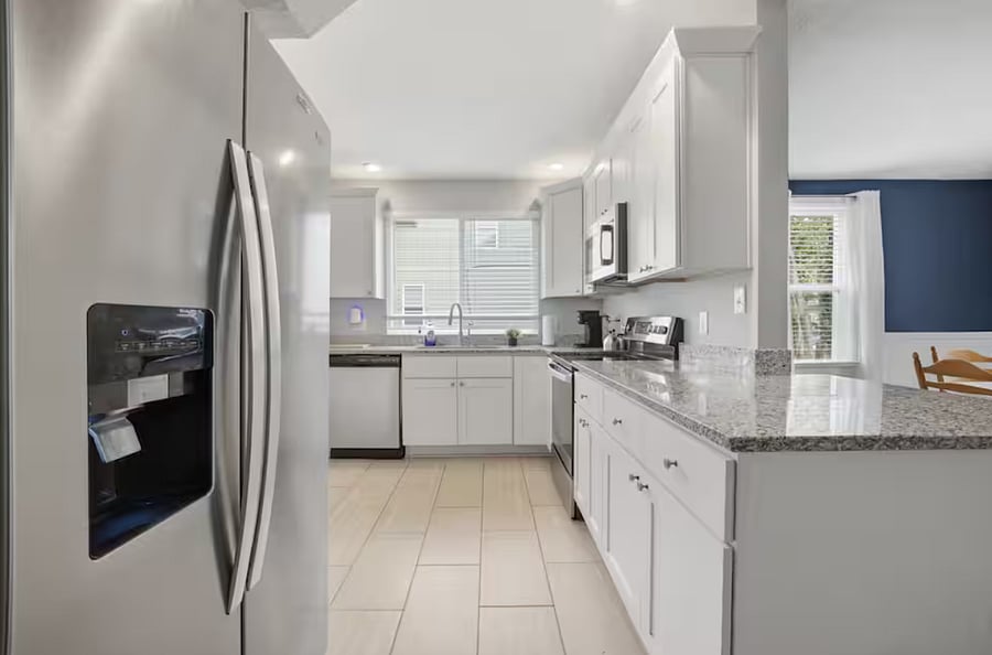 The kitchen is super bright and clean.