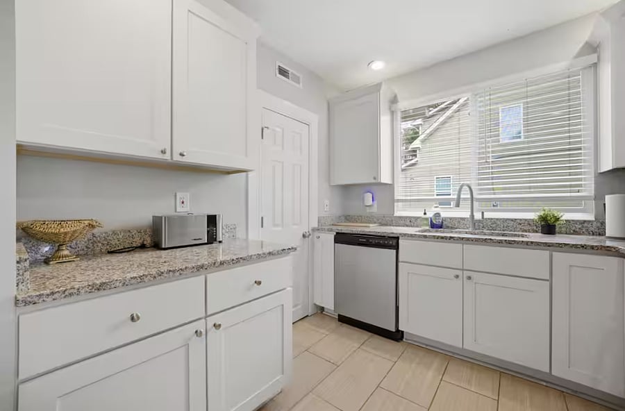 Another angle of the kitchen, super clean and ready for your first grocery haul.