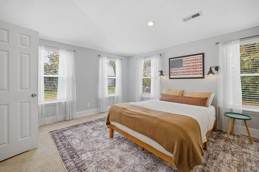 Room 1: Primary bedroom with Queen size bed. Very spacious with walk-in closet and en suite bathroom.