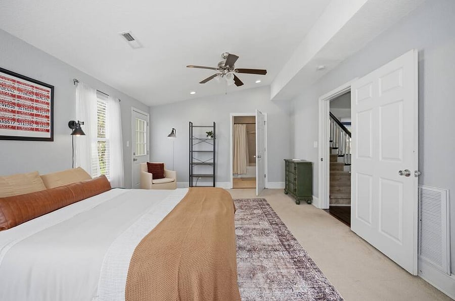 Room 1: Primary bedroom with Queen size bed. Very spacious with walk-in closet and en suite bathroom.