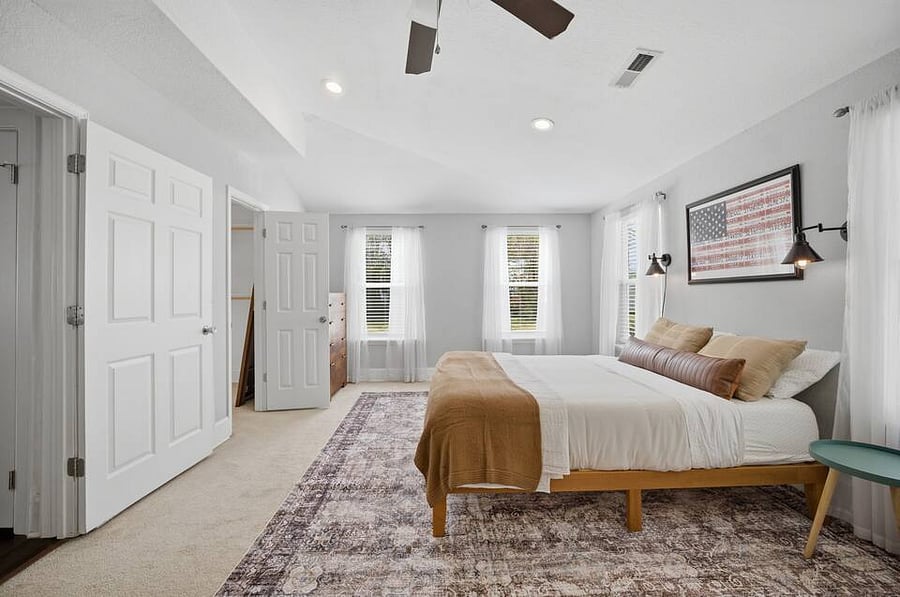 Room 1: Primary bedroom with Queen size bed. Very spacious with walk-in closet and en suite bathroom.
