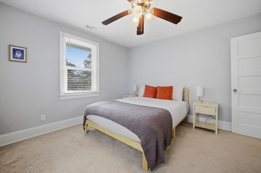 Bedroom 2: Another large bedroom with a Queen size bed and plenty of light