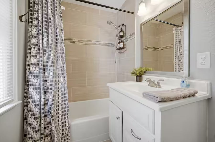 Full bathroom in upstairs hallway.