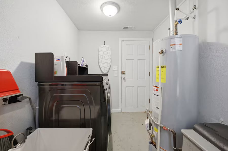 A practical, dedicated laundry and utility space that keeps the chores tucked away and organized.