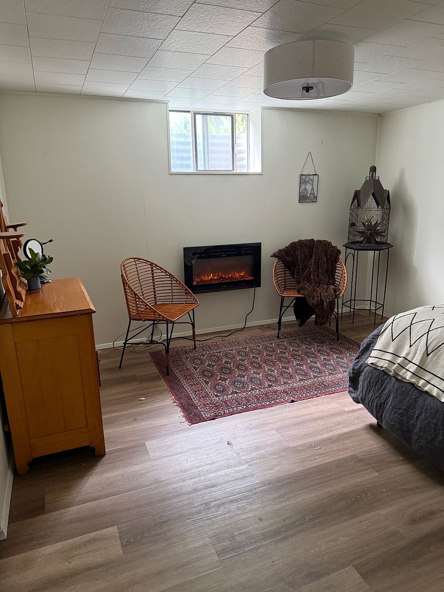 Electric fireplace for ambience and heat.