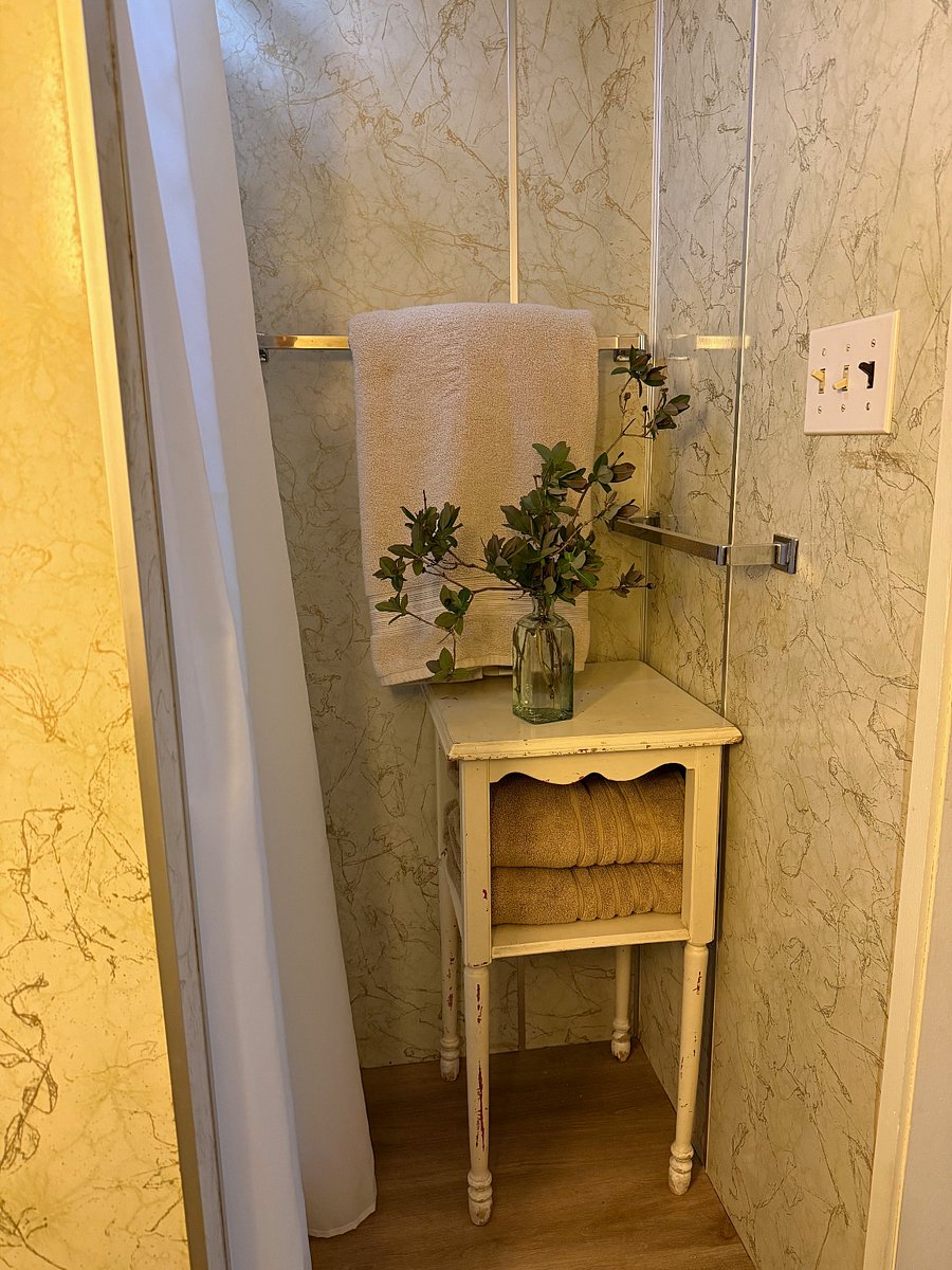 Stall shower. Towels included.