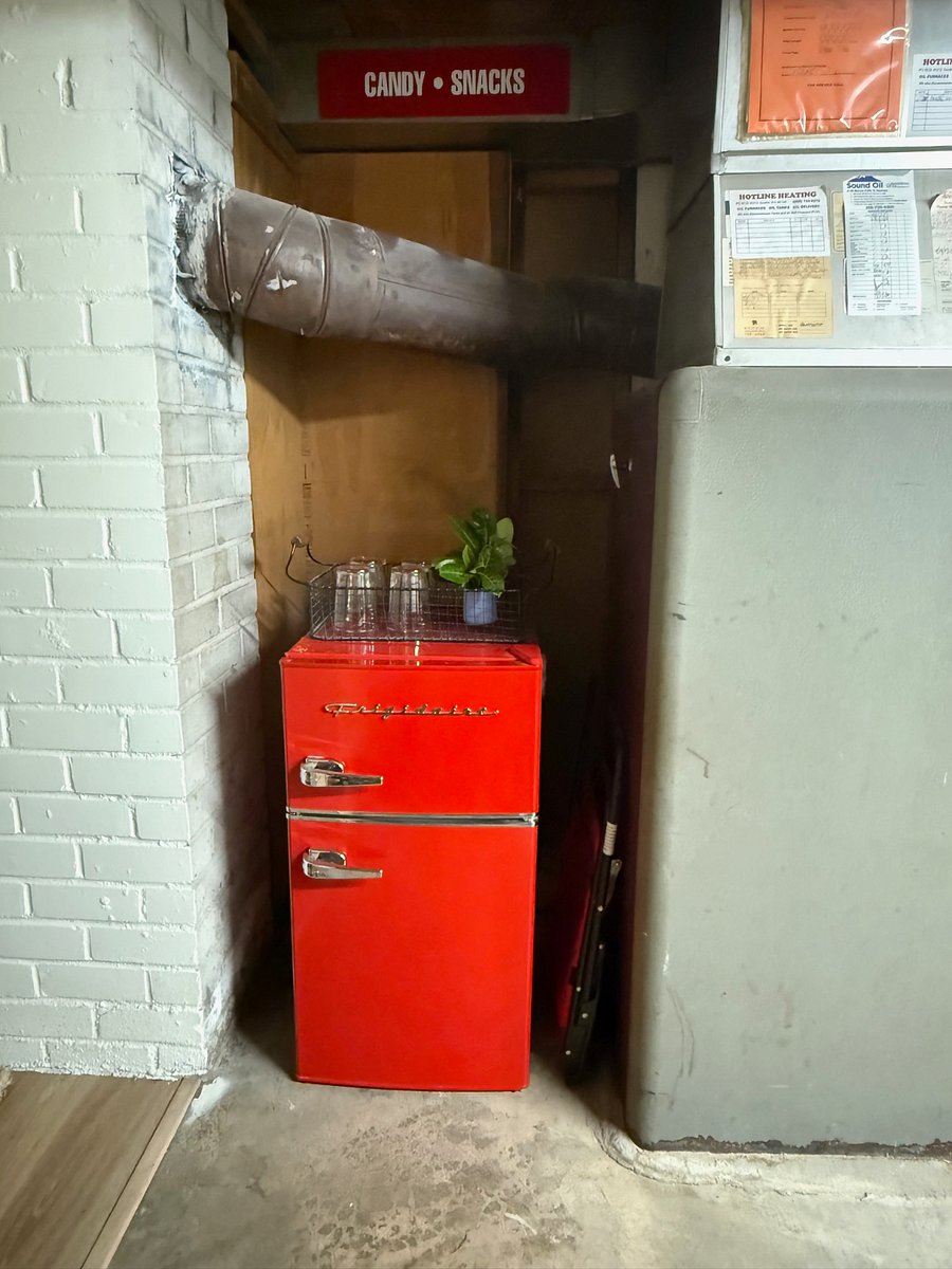 Dorm sized fridge but with freezer section and ice trays.