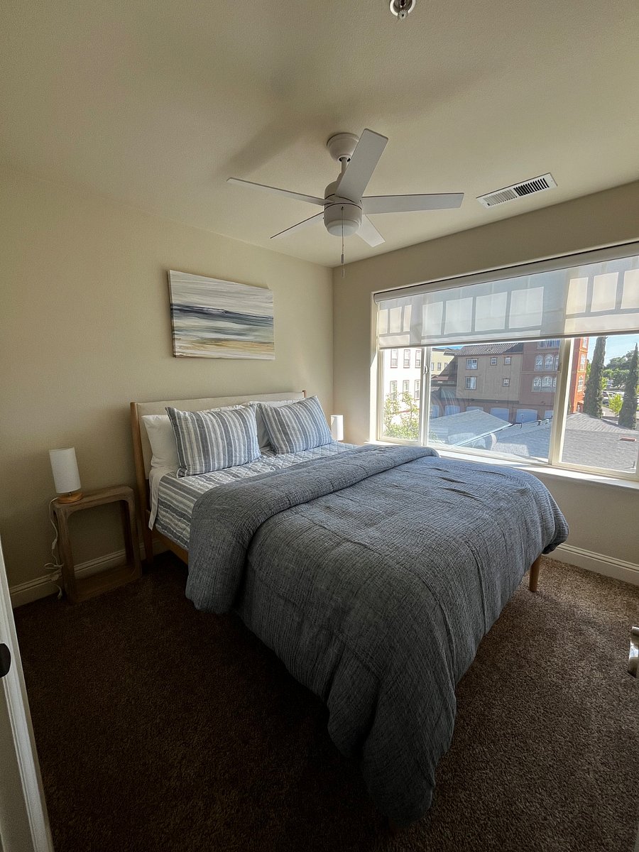 Bedroom #2 - Queen bed. Room has ceiling fan.