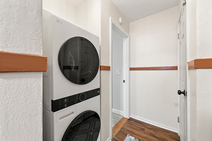 Shared laundry just outside the bathroom