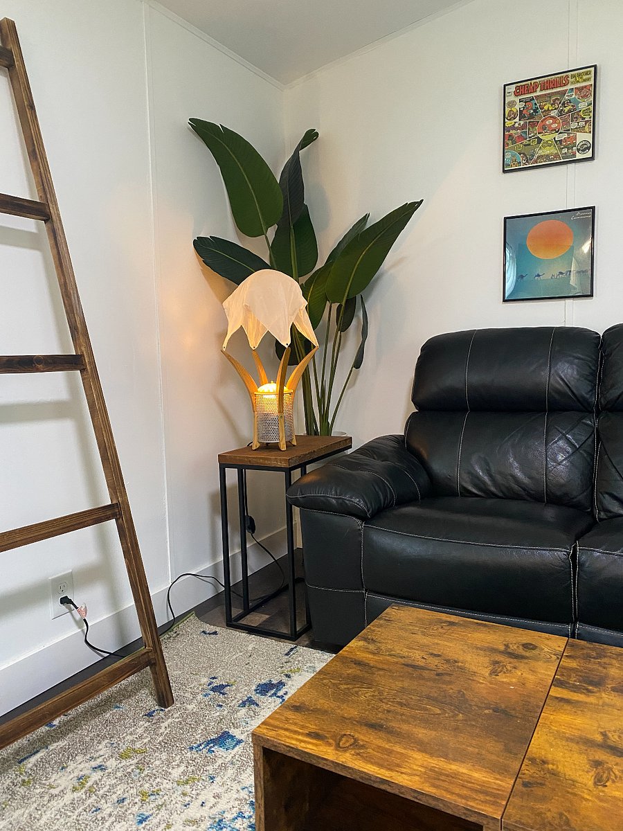 Cozy and Cool Living area with quality leather reclining furniture