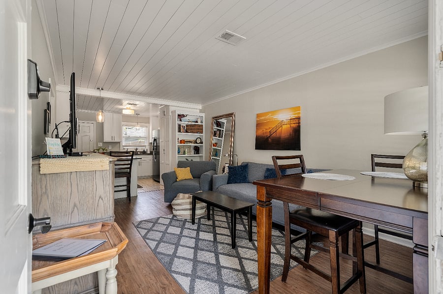 The living room and kitchen stay perfectly lit most of the day with the bright shiplap ceiling giving the rooms a great feeling of warmth and energy.