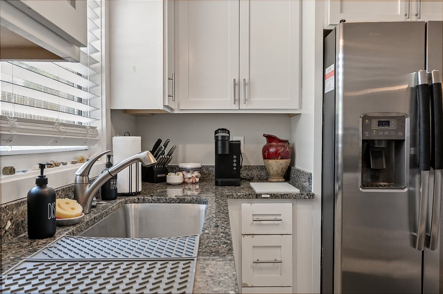 The coffee corner!  All the coffee is in that first drawer under the Keurig machine.

We also have a toaster, Crockpot, cleaning supplies, pots/pans, silverware and tons of other kitchen gadgets!