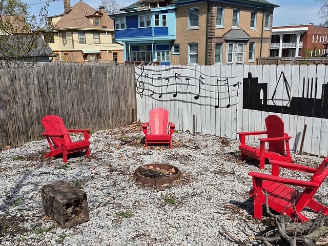 outdoor seating around fire pit in backyard
