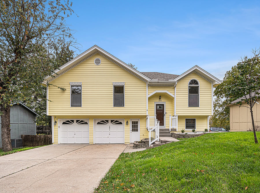 The front of the home greets you with a bright, welcoming charm, offering a cheerful first impression that beautifully sets the tone for a warm and inviting living space.