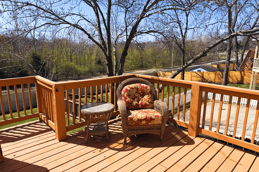 A charming balcony retreat with a cozy solo couch and side table, ideal for intimate moments, twilight reading, or simply enjoying the gentle breeze in style.