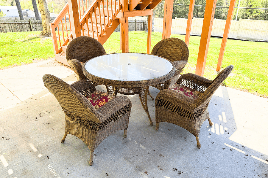 A charming 4-seater cozy nook with a round table, nestled near the backyardperfect for morning coffee, casual meals, or relaxing conversations surrounded by nature.