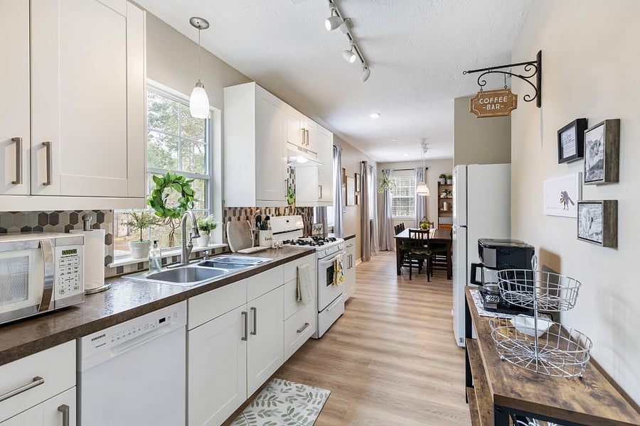 Fully equipped kitchen with full size refrigerator, dishwasher, gas range, coffee maker, toaster and insta-pot.
