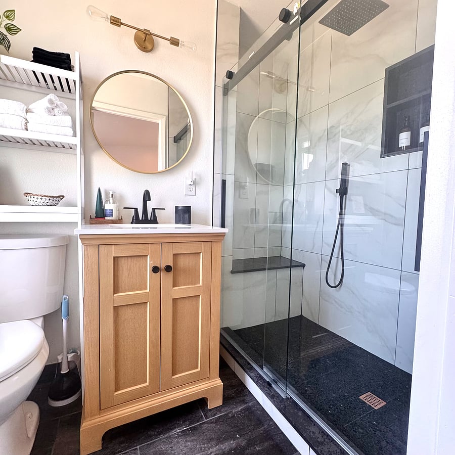 Private master bath with walk-in shower, bright vanity, and fresh towels. Clean, spacious, and easy to use.