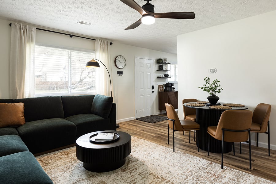 Alternate living room view with window and seating