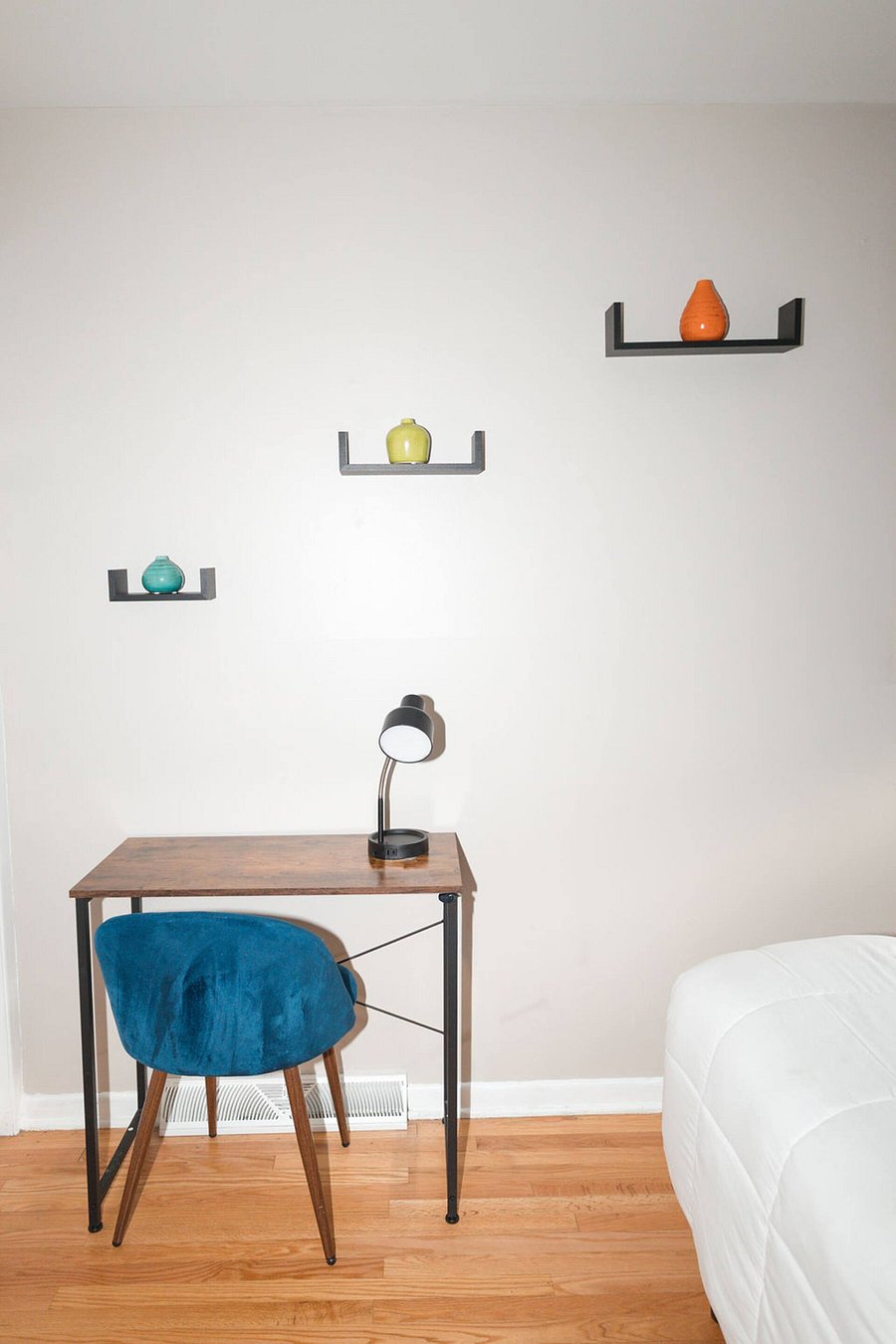 Bedroom 1 with dedicated work space.
