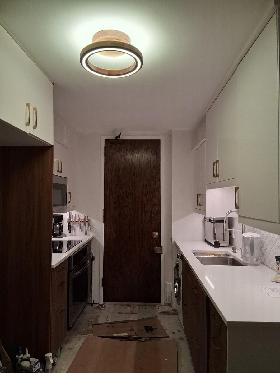 Please note kitchen flooring is being installed, and full fridge is in dining room for the moment