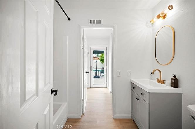 Guest Bathroom with Laundry Access