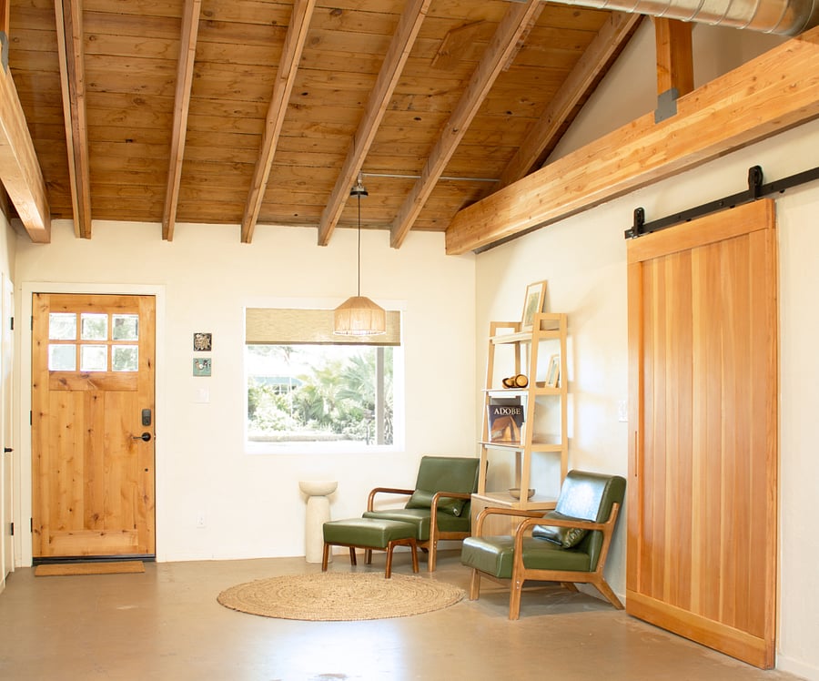 Welcoming entry lounge with comfortable seating and warm architectural details.