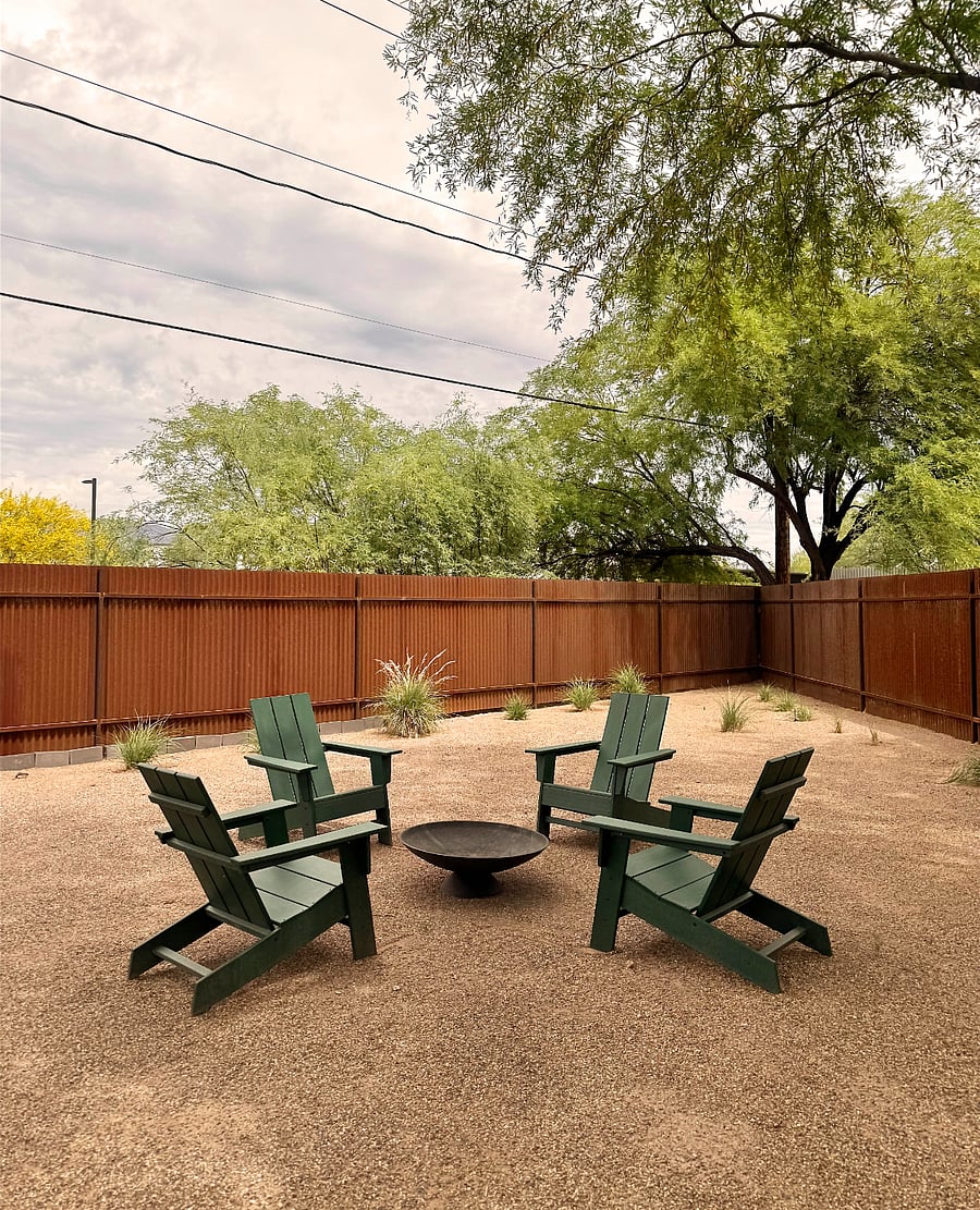 Your private sunset lounge. These four Adirondack chairs are the best seats in the house for crisp mountain air and fireside chats.