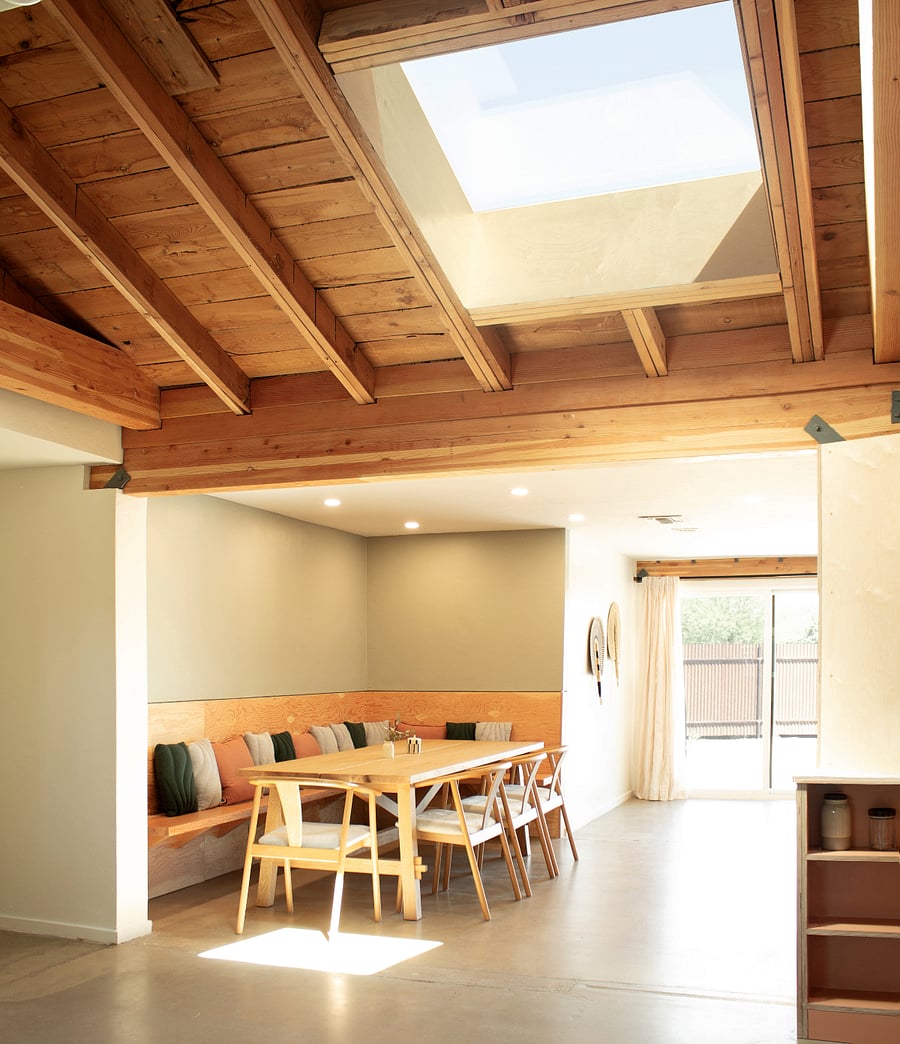 Dining area with skylight and seating for large groups.
