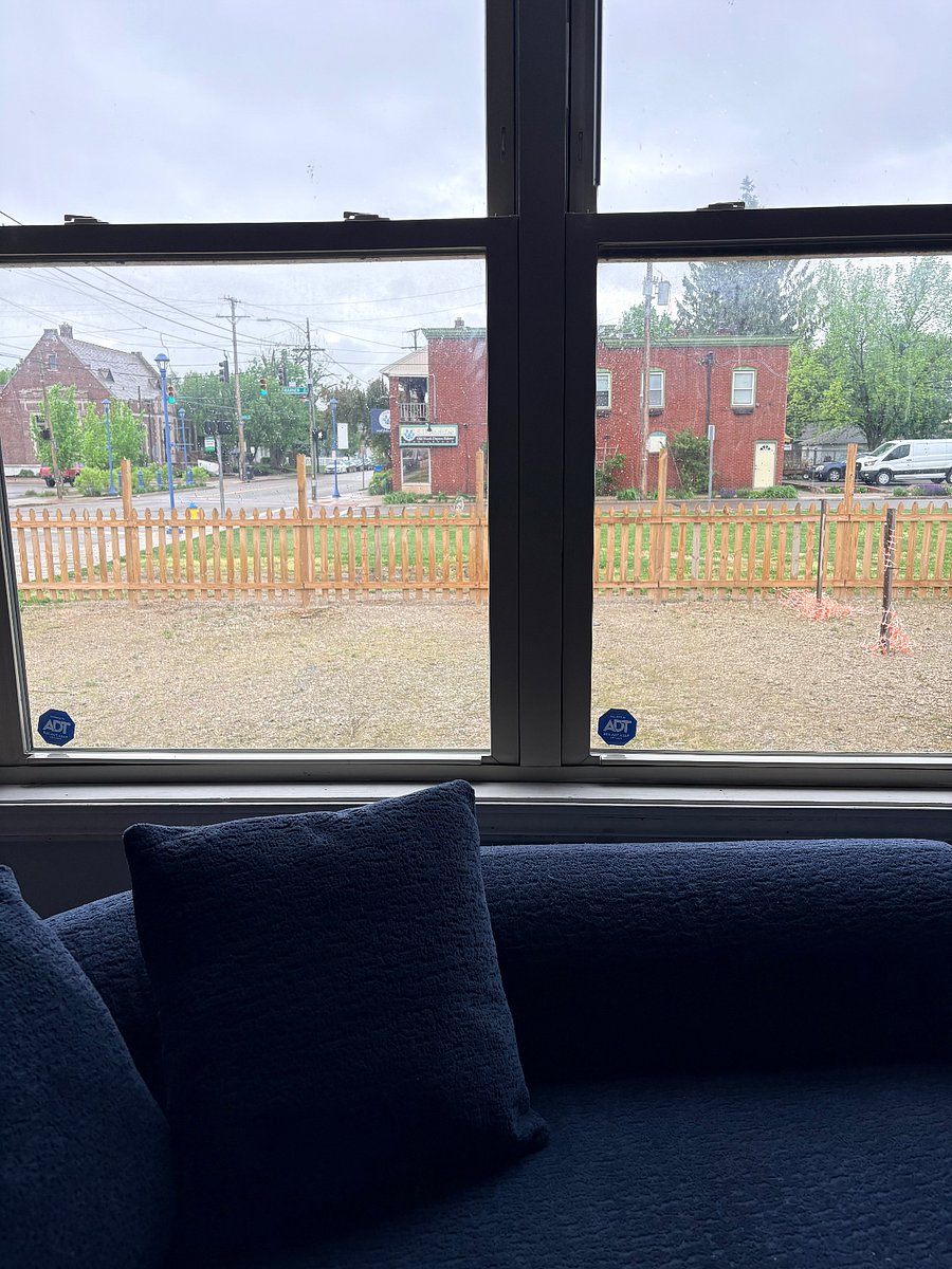 View from living room to local bakery and library.