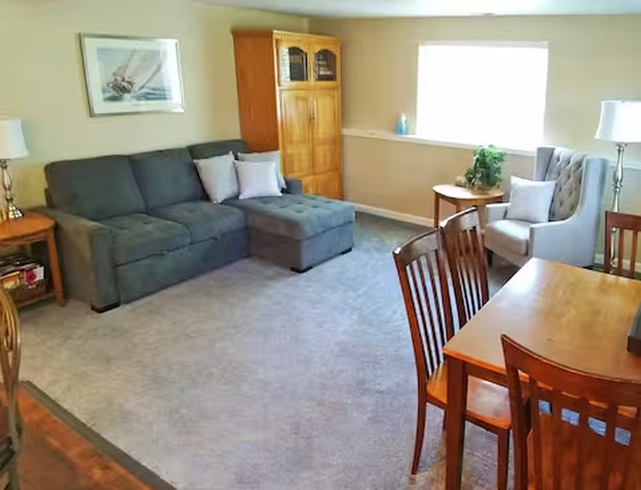Living room. DVD player, dining area / computer table, TV. Pull out bed.