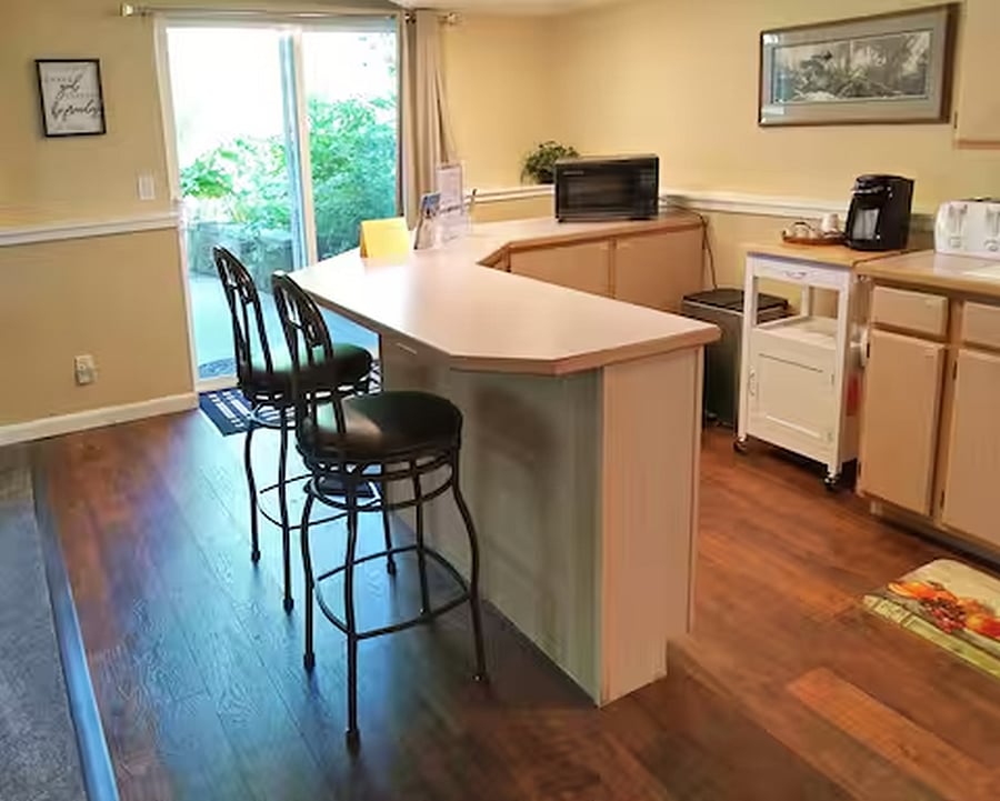 Kitchenette. Full size fridge & ice maker, coffee maker, gas stove, microwave.