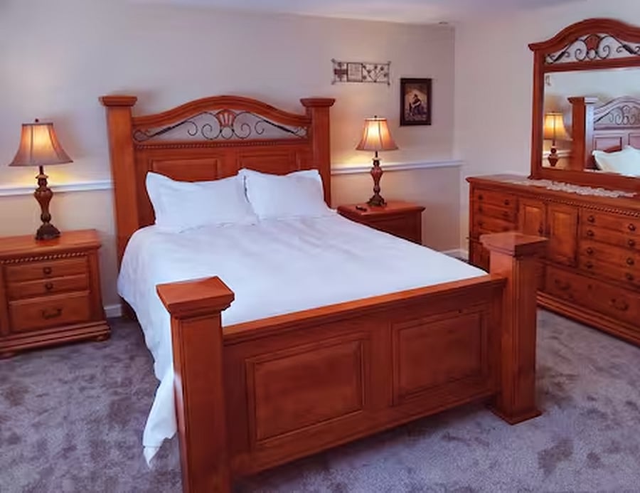 Queen size bed, two night stands, dresser, closets and 55" Smart TV.