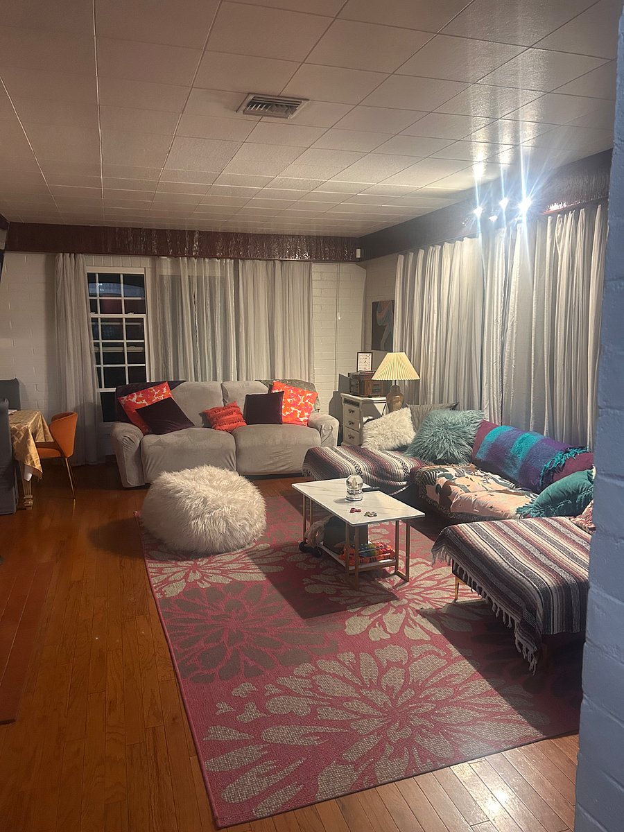 Living room with two chaises and a big double recliner