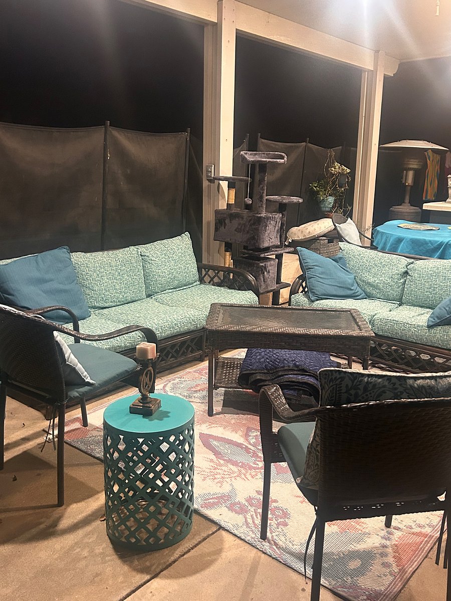 Outdoor sitting area under covered patio