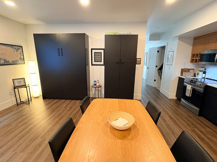 Dining space and large cabinet storage plus queen-sized Murphy bed 
